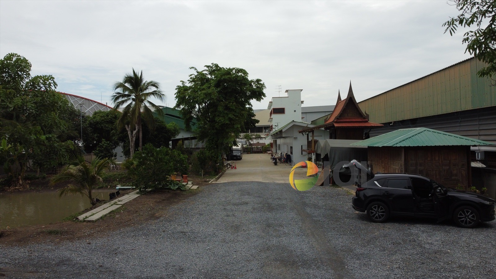 Land for sale 4-0-10 rai with office building and 3-storey house, Bang Bua Thong - Suphan Buri Road image
