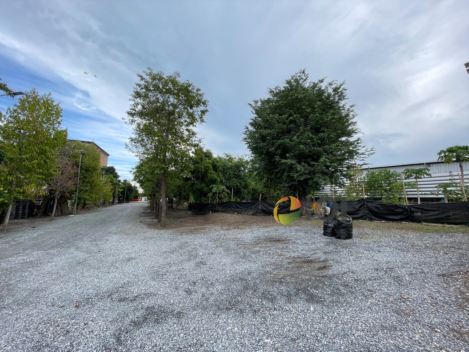 Land for sale 4-0-10 rai with office building and 3-storey house, Bang Bua Thong - Suphan Buri Road image