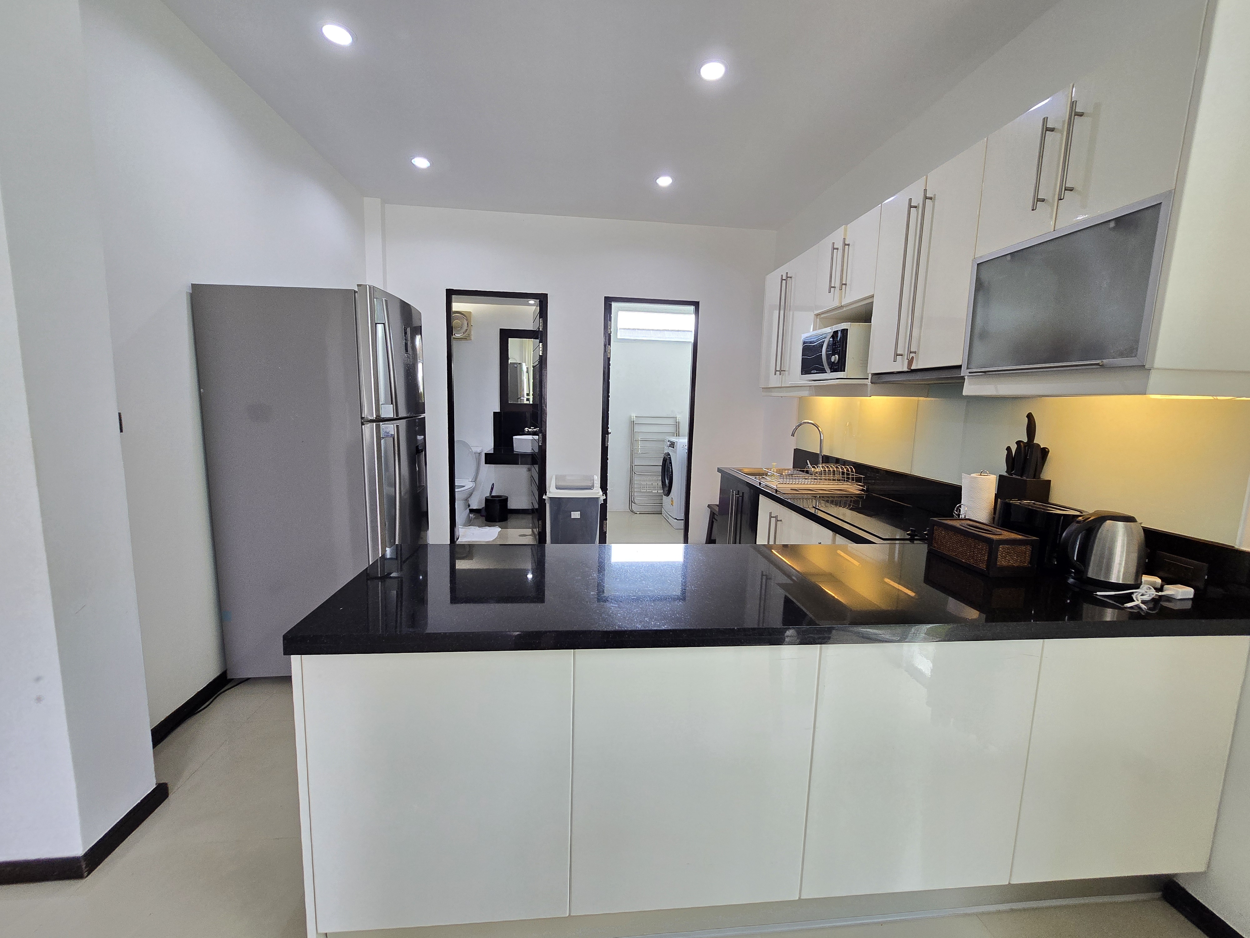 Spacious 3-Bedroom Duplex Condominium with Private Pool – Nai Harn, Phuket image
