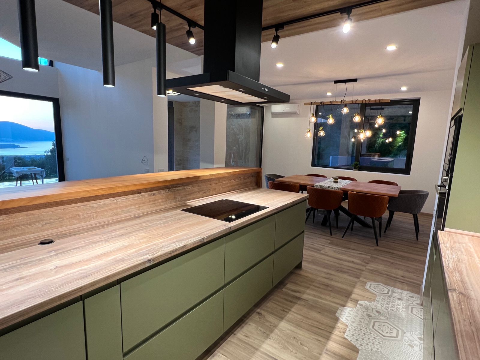 Modern Four-Bedroom Family Villa with Rooftop Pool and Panoramic Sea Views image