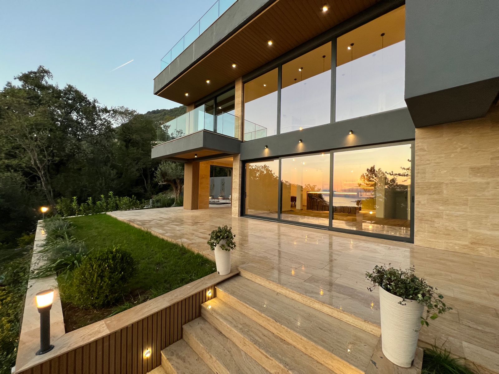 Modern Four-Bedroom Family Villa with Rooftop Pool and Panoramic Sea Views image