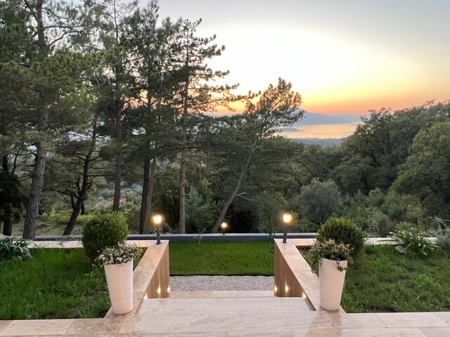 Modern Four-Bedroom Family Villa with Rooftop Pool and Panoramic Sea Views image