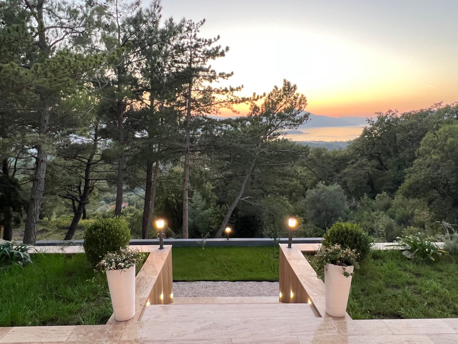 Modern Four-Bedroom Family Villa with Rooftop Pool and Panoramic Sea Views image