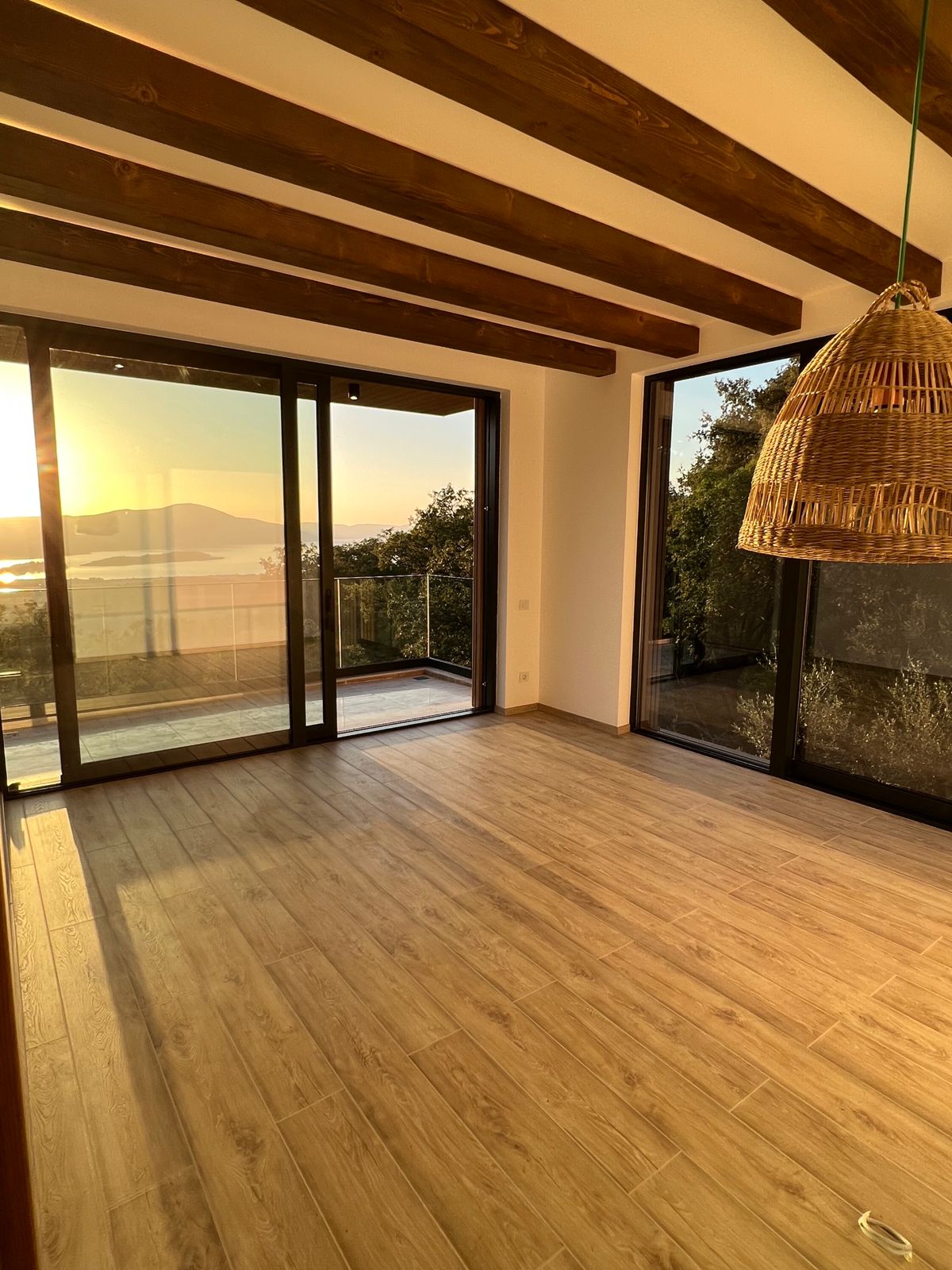 Modern Four-Bedroom Family Villa with Rooftop Pool and Panoramic Sea Views image