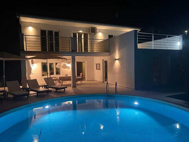 Charming Family House with Pool, Green Yard & Stunning Sea Views image