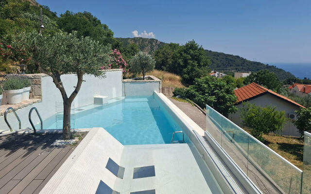 Authentic Stone Villa with Infinity Pool and Panoramic Sea Views image